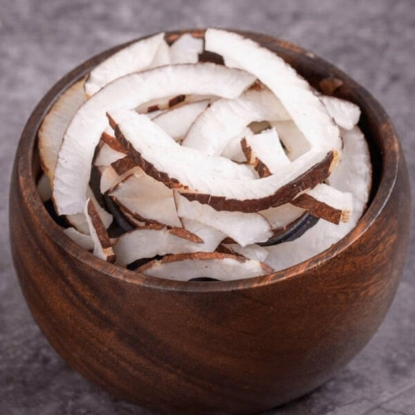 Brazilian desiccated coconut flakes in a bowl for wholesale food manufacturing applications